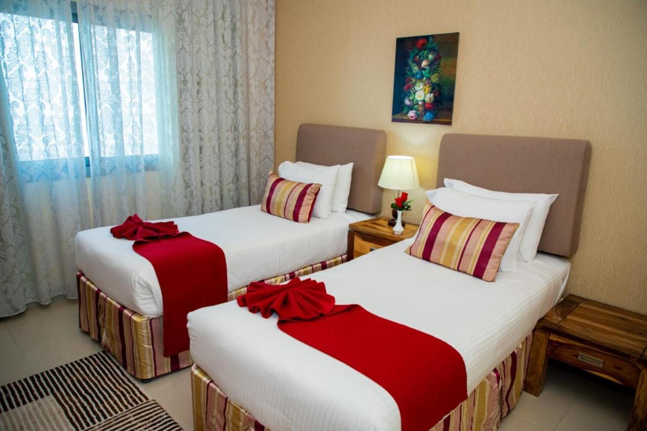 Ewan Tower Hotel Apartments Adzsmán Kültér fotó