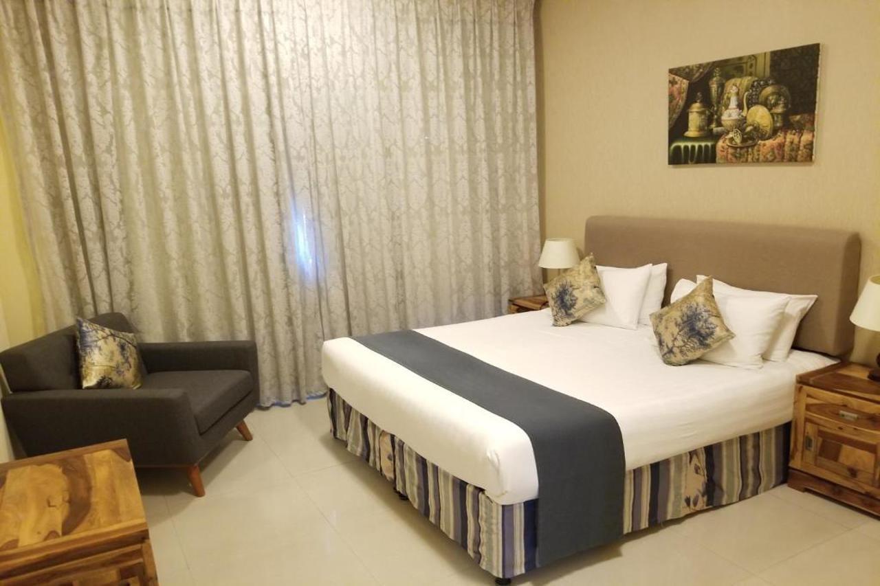 Ewan Tower Hotel Apartments Adzsmán Kültér fotó