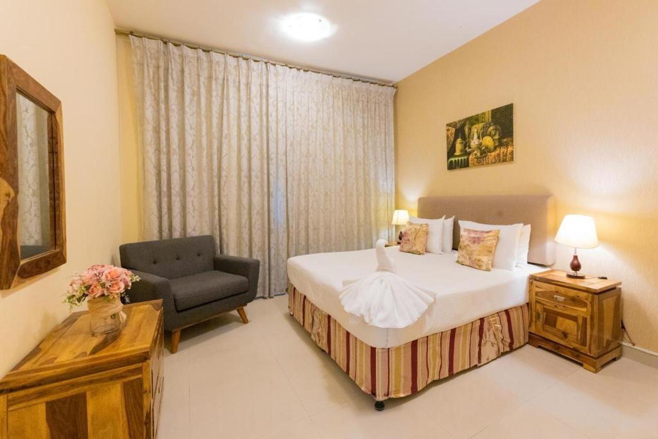 Ewan Tower Hotel Apartments Adzsmán Kültér fotó