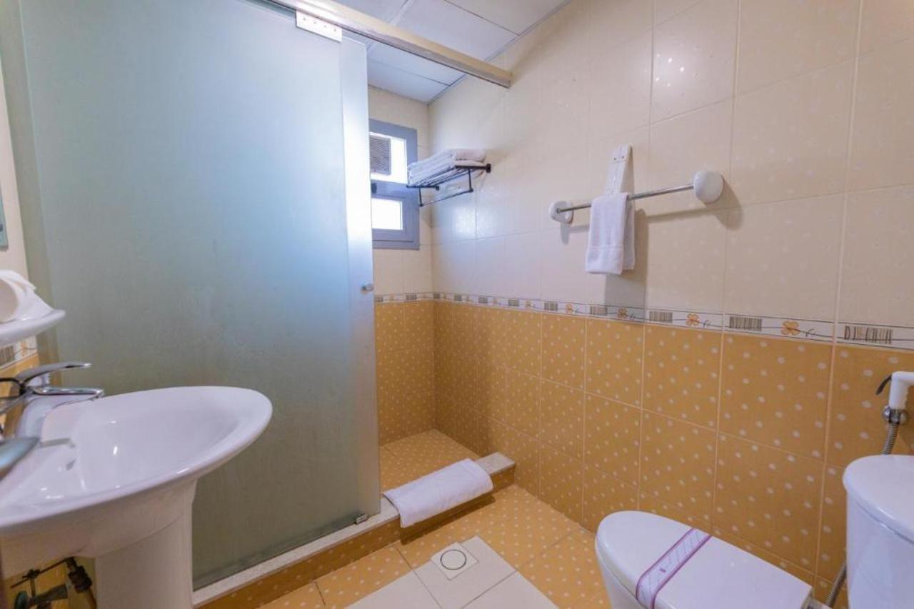 Ewan Tower Hotel Apartments Adzsmán Kültér fotó