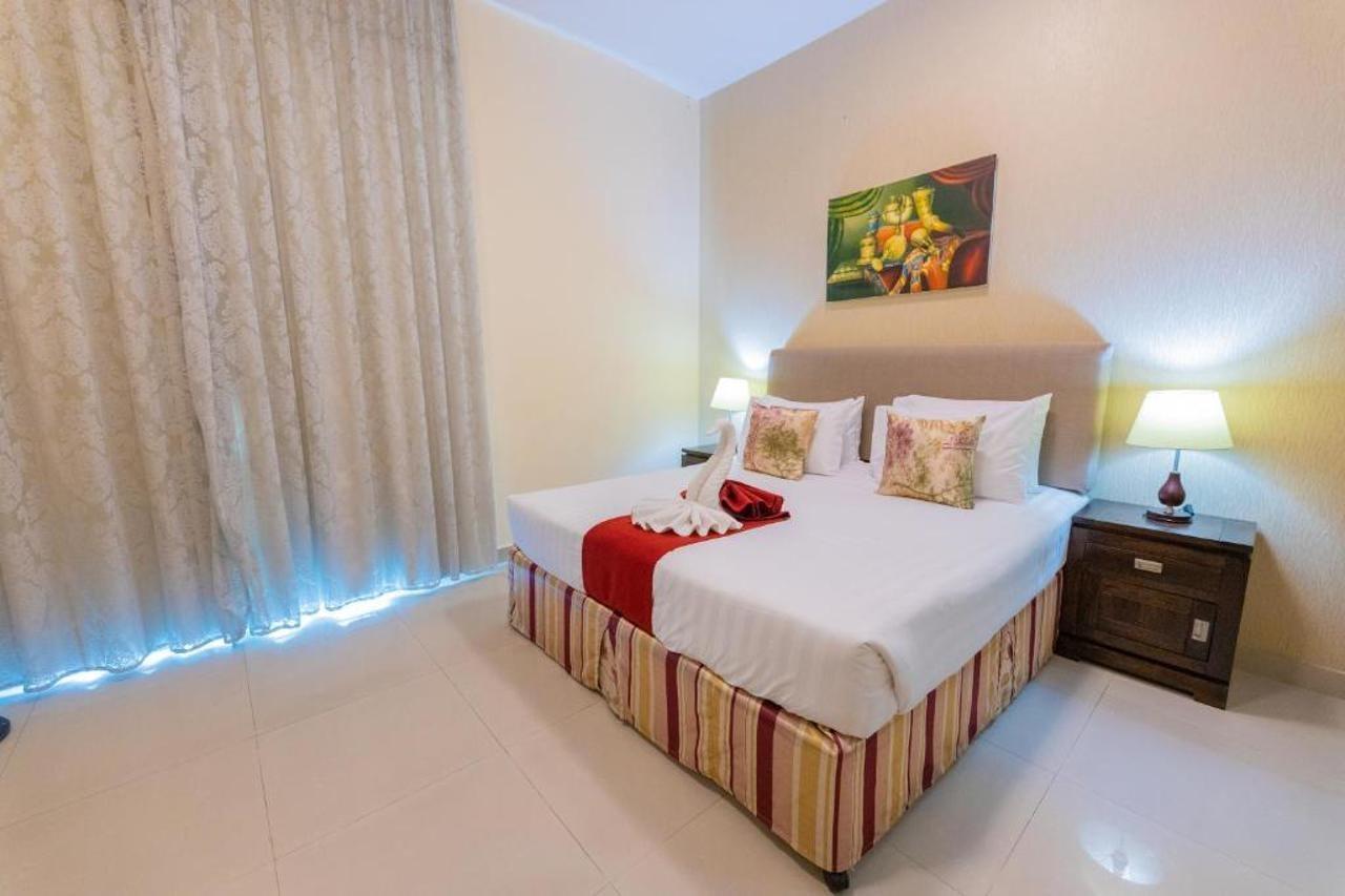 Ewan Tower Hotel Apartments Adzsmán Kültér fotó